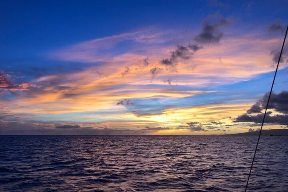 Board from Waikiki Beach: Scenic Sunset Sail on the Hāwea - The Diamond Head sunset: what changes when you’re offshore