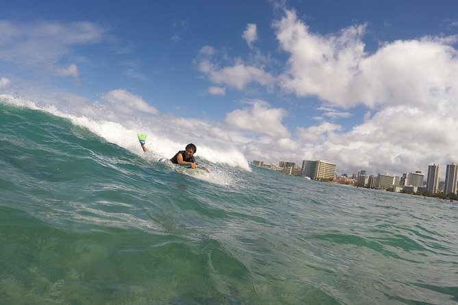 Bodyboarding 1-to-1 Private Lesson with Waikiki Courtesy Shuttle - Walking your lesson board to the beach and getting matched to your level