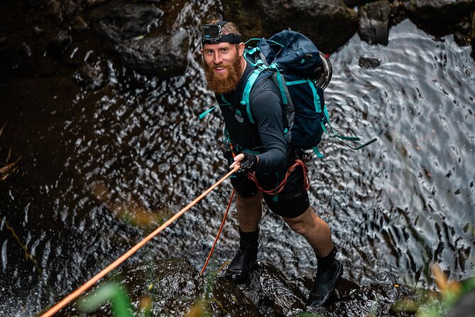 Chasing Waterfalls:Wild Hawaii Rappelling - Rappelling the waterfall: adrenaline with safety guardrails