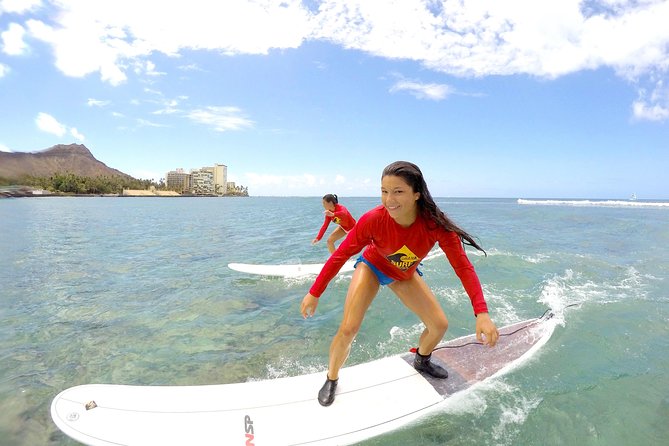 Exclusive Group Surfing Lesson with Waikiki Courtesy Shuttle - Sand Basics to First Tries: How You Learn the Move Before the Panic
