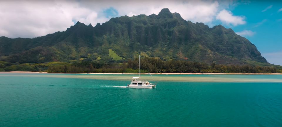 Oahu: Molii Fishpond and Kaneohe Bay Catamaran Tour - Kualoa Ranch check-in and the exact vibe you’re walking into