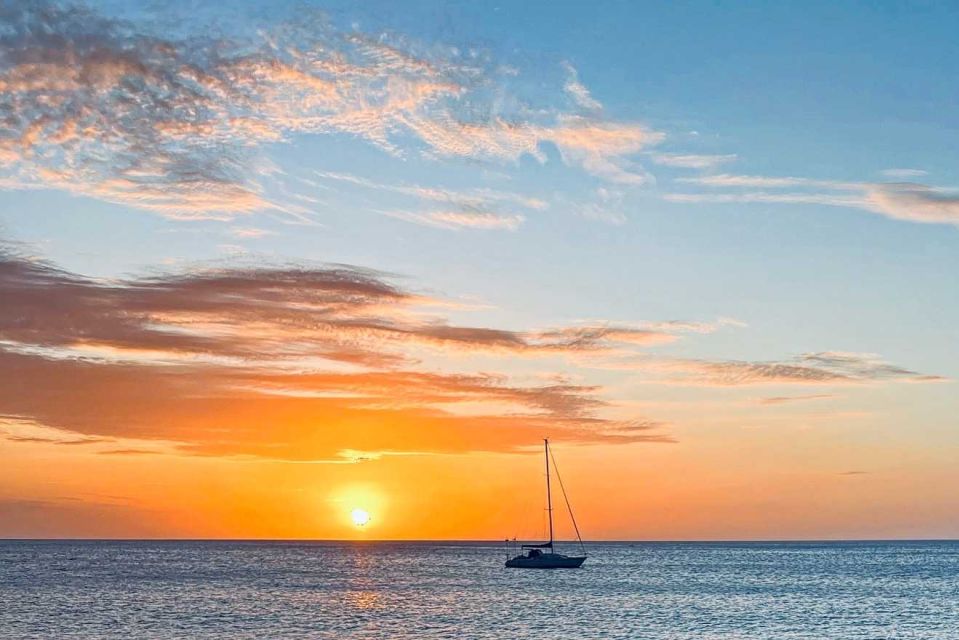 Oahu: Sunset sailing in small intimate groups - Sailing Honolulu’s South Shore Toward Diamond Head (Le’ahi)