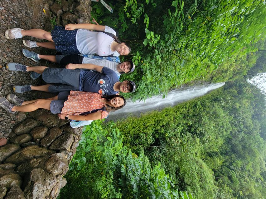 Oahu: Waikiki E-Bike Ride and Manoa Falls Hike - Stopping at the trailhead: locking the bike and switching to your feet