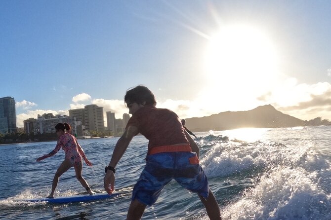 Private Surf Lesson in Waikiki - What to wear so wax does not ruin your forearms