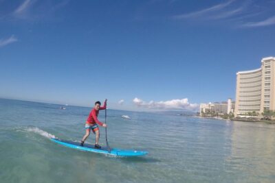 Semi-Private Stand Up Paddle Lesson with Waikiki Courtesy Shuttle - Gear Included: Reef Shoes, Rash Guard, Paddle, Board