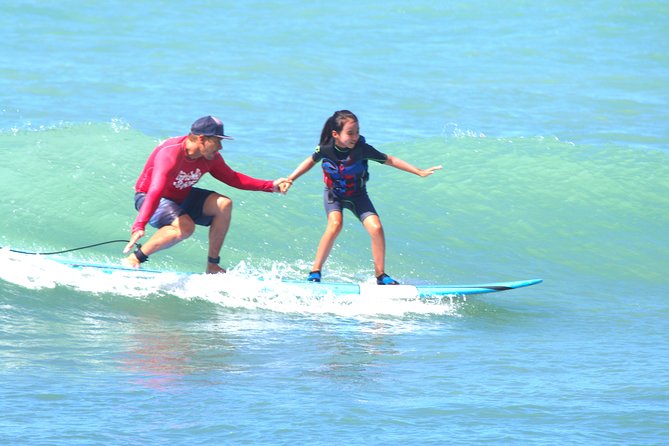 Surf HNL: Surf Lessons near Ko'olina!!!!! - Gear that removes obstacles: reef shoes, rash guard, and the right board
