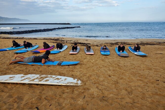 Surf Lessons on the North Shore Great for Families and all Ages - What’s included: longboard gear, rashguard, and beach coaching