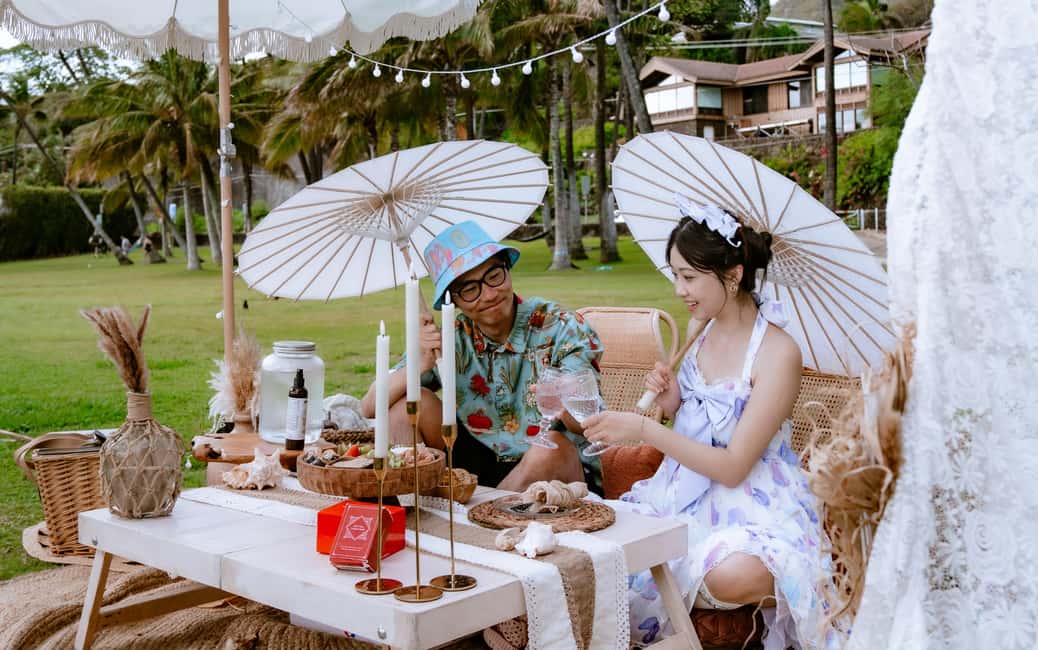 Waikiki : Beach Picnic with Professional Photography! - Performance moments: fire, guitar serenade, lei making, plus a dance snippet