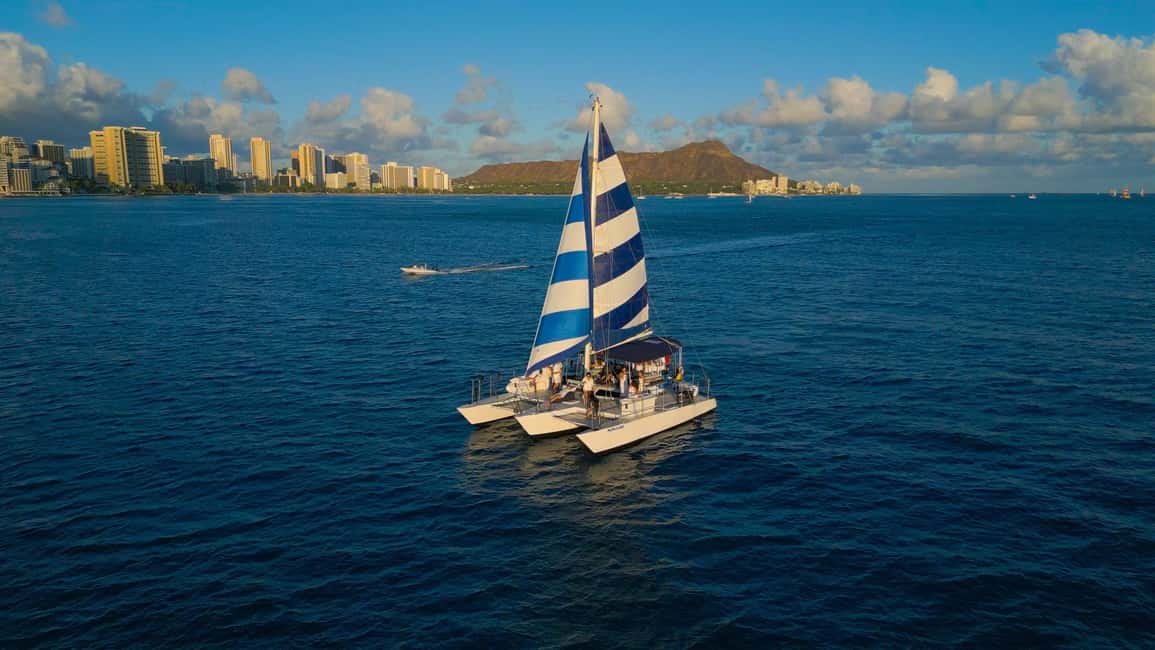 Waikiki: Sunset Swim & Sailing Experience - Key Moments That Make This Waikiki Sunset Cruise Work